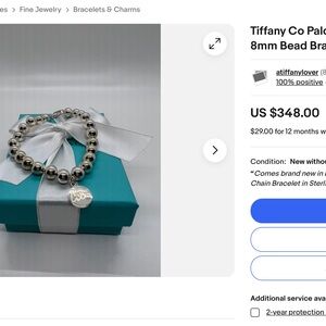 Tiffany &Co. bead bracelet with love charm